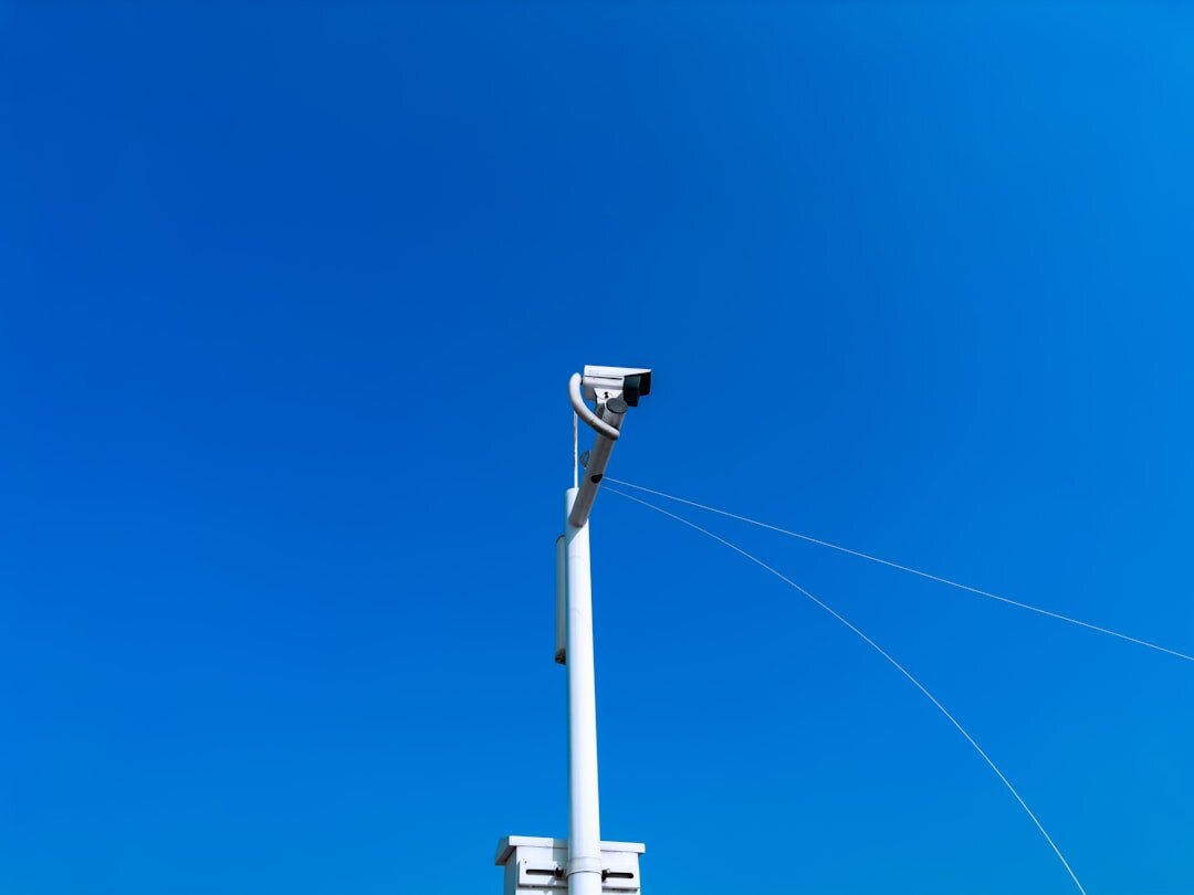Wireless camera beam transmitter device on a stand